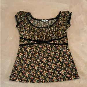 Soft floral ruffle and lace top.